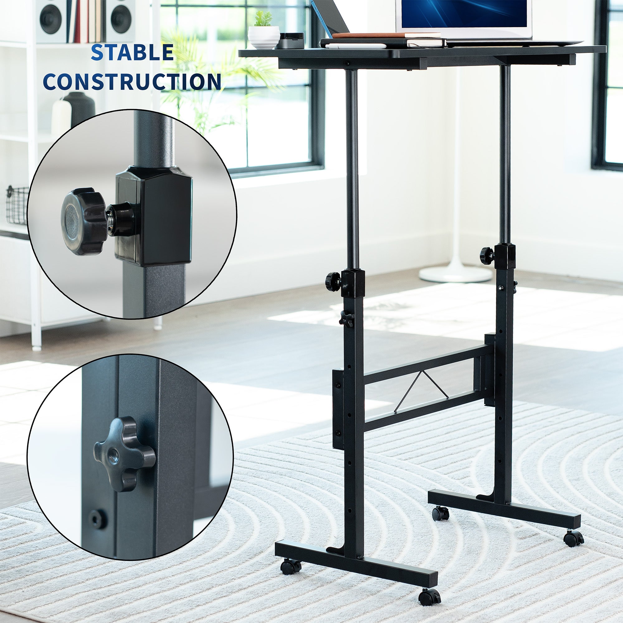Adjustable standing desk cart with stable construction features highlighted