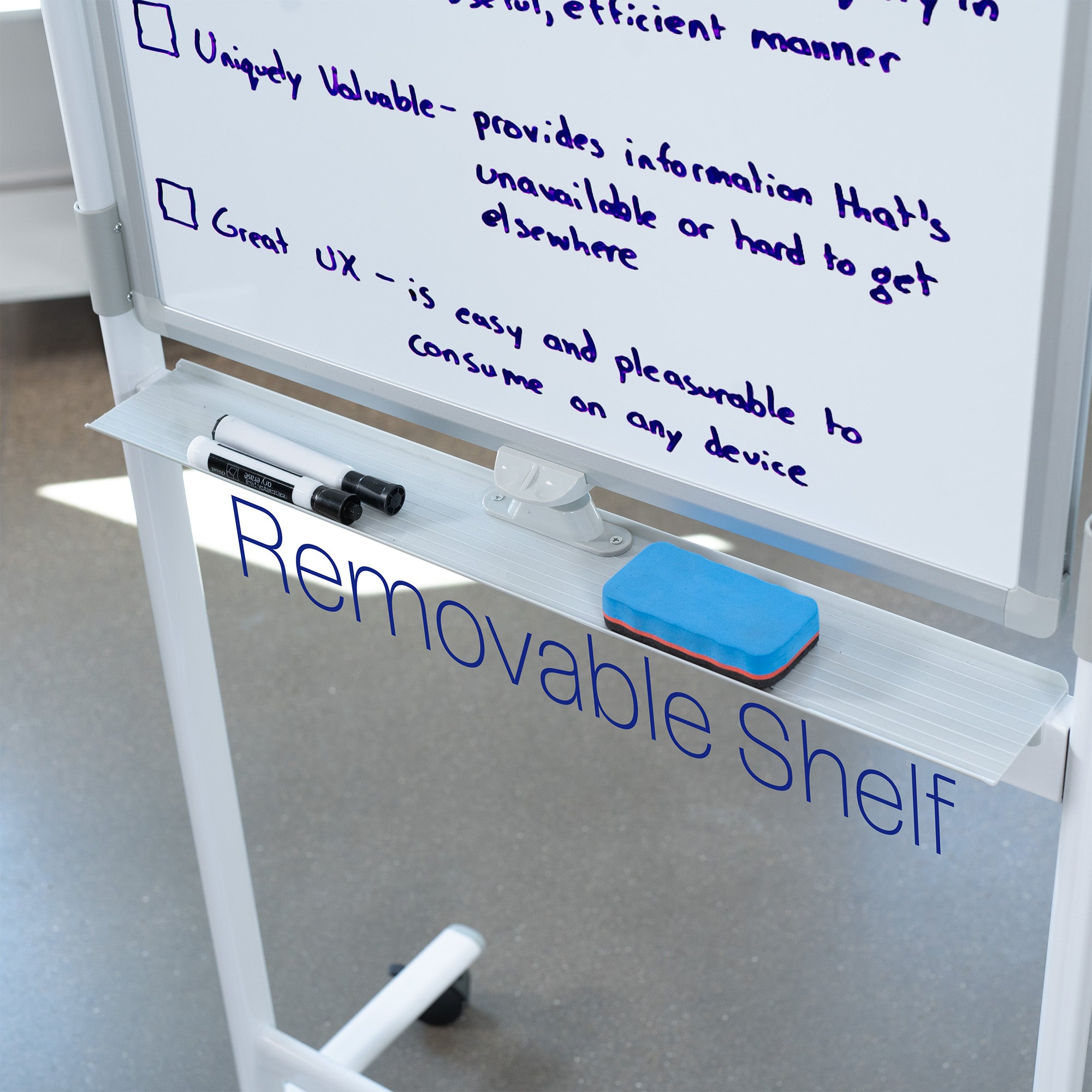 Removable dry erase shelf.