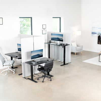 Adjustable standing workstation desk for a modern office workspace.