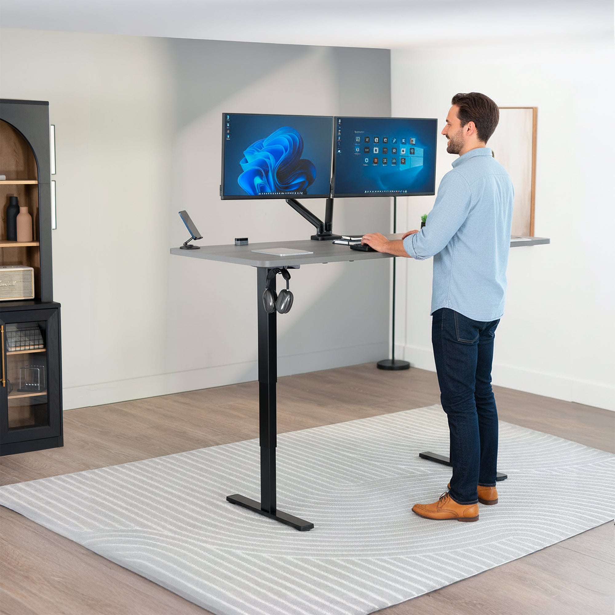 Man Standing at Gray Desktop 2E Series - 71" x 30" Electric Desk with Touch Screen Memory Controller