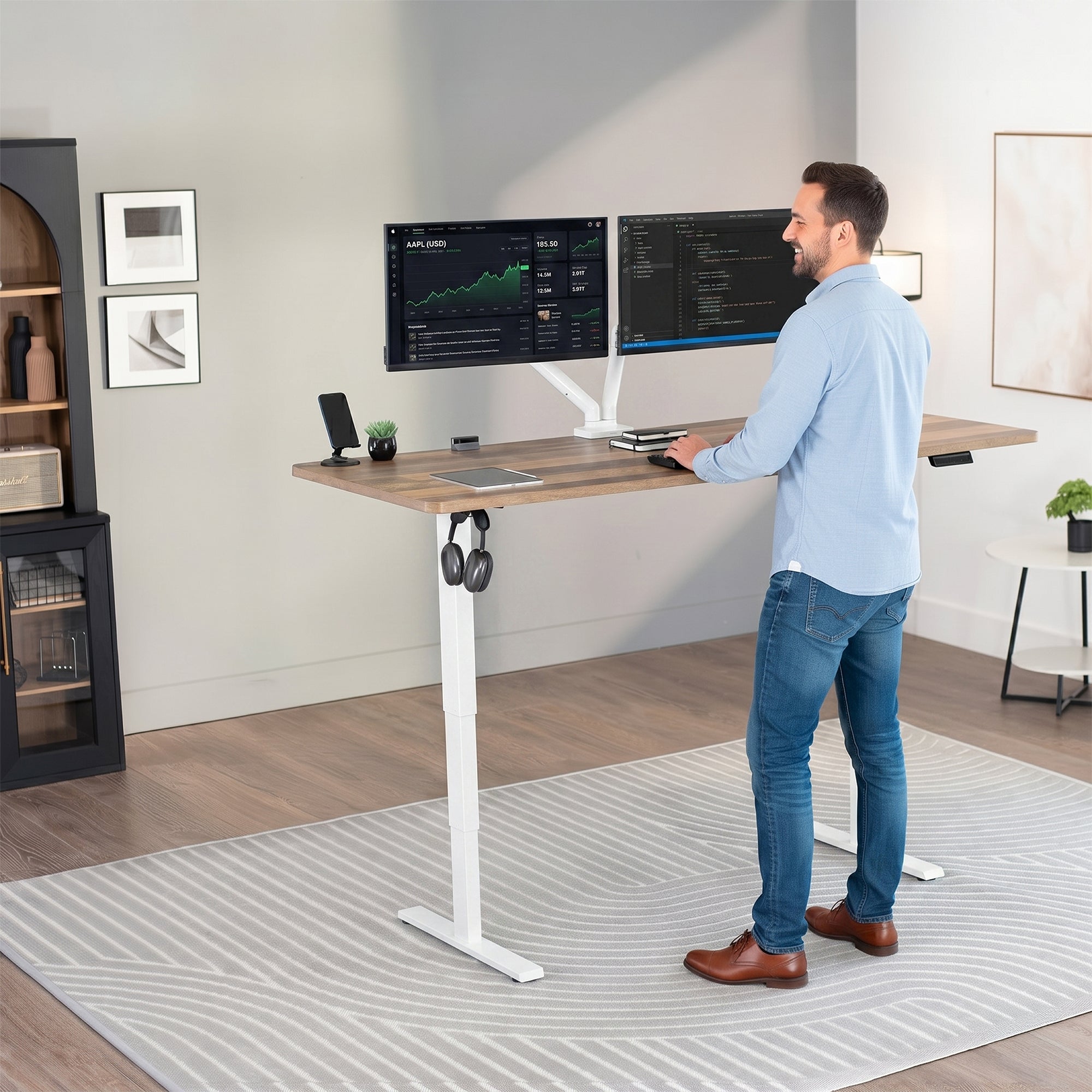 Heavy-duty electric height adjustable desktop workstation for active sit or stand efficient workspace.