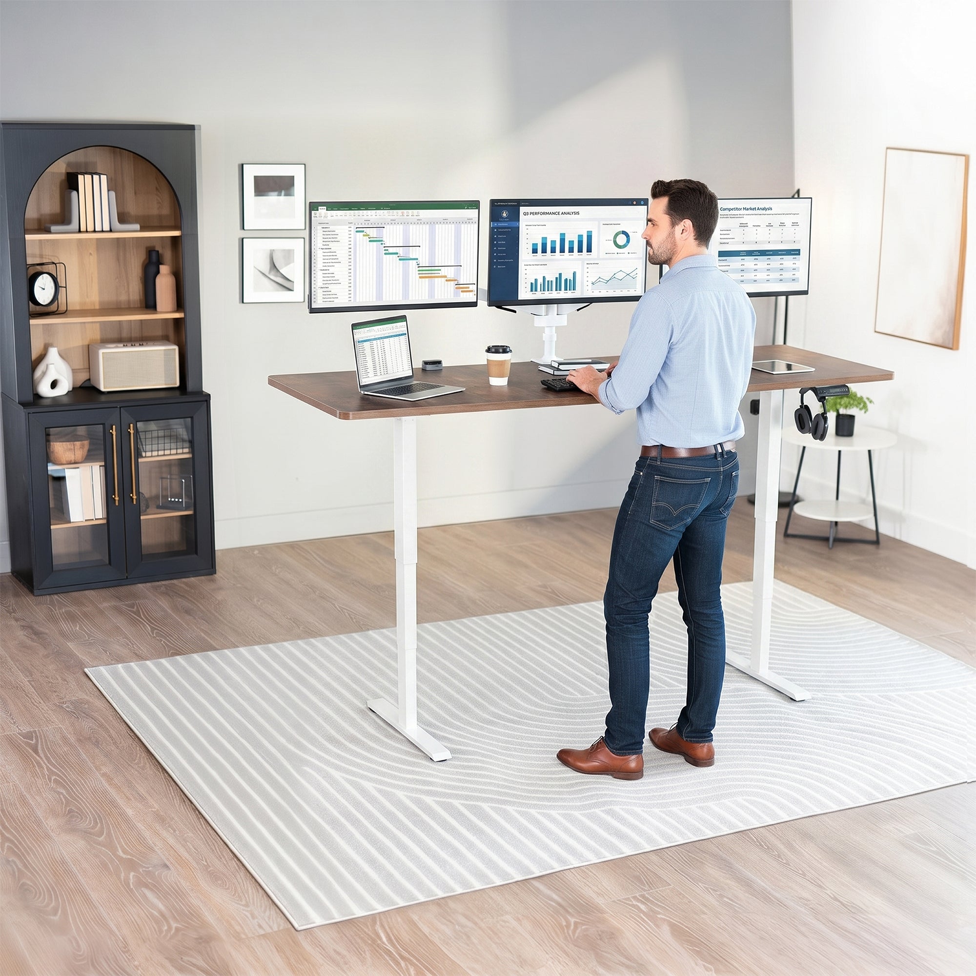 Man standing at the 2E Series - 83" x 30" Electric Desk with Touch Screen Memory Controller in office space