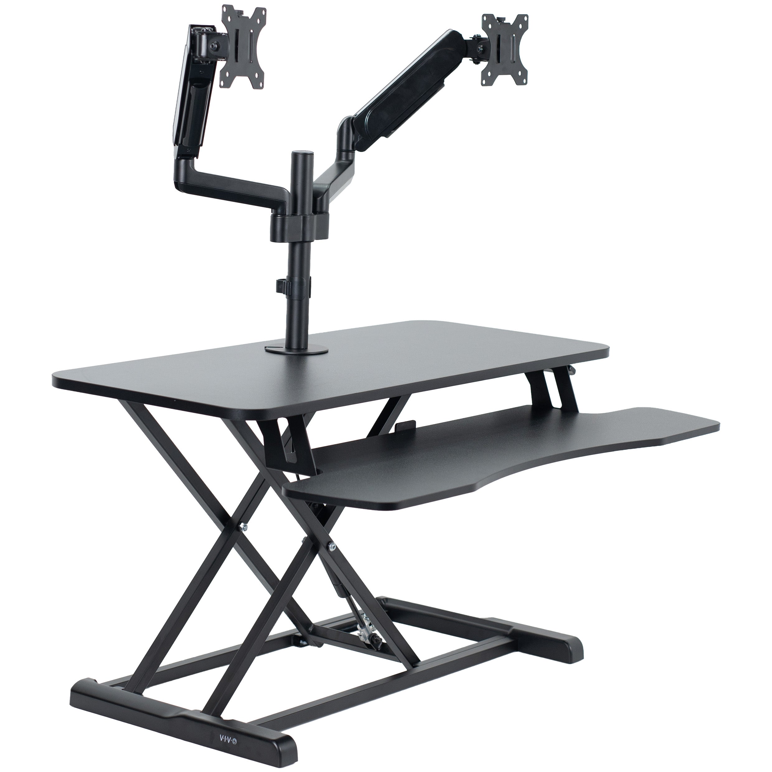 36 inch height adjustable desk riser with articulating mechanical dual monitor mount.
