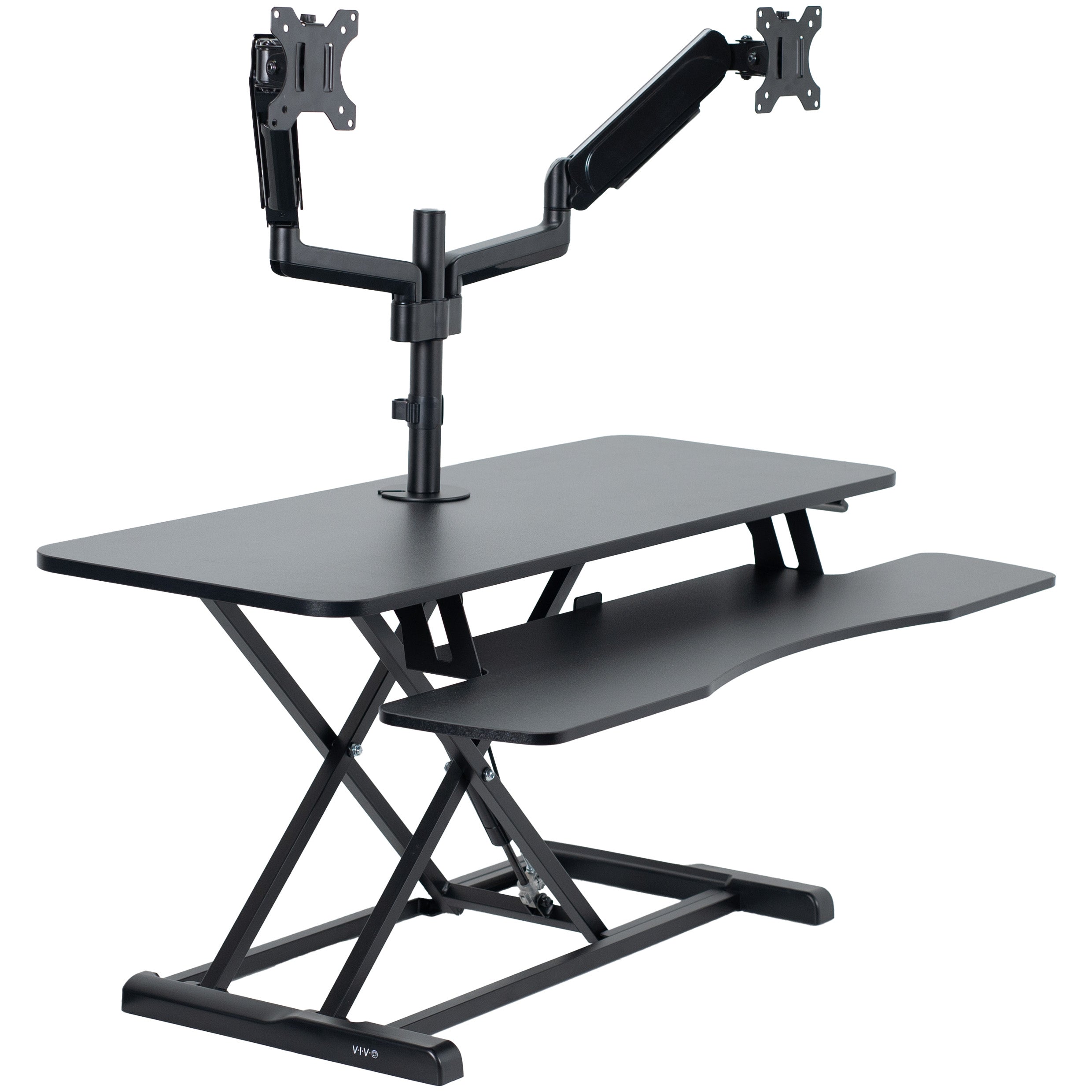 42 inch height adjustable desk riser with articulating mechanical dual monitor mount.