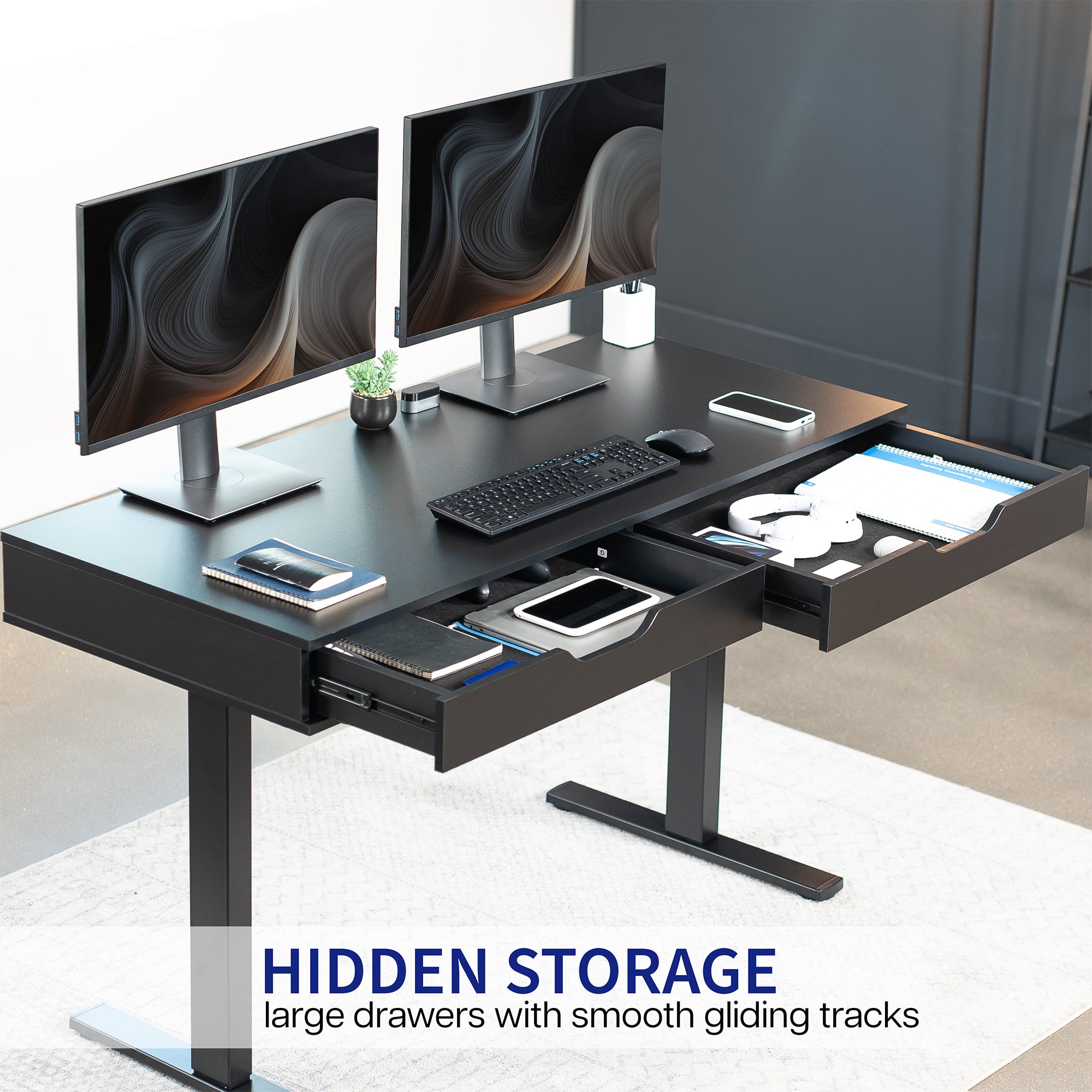 Black desk drawer with text displaying hidden storage capability.