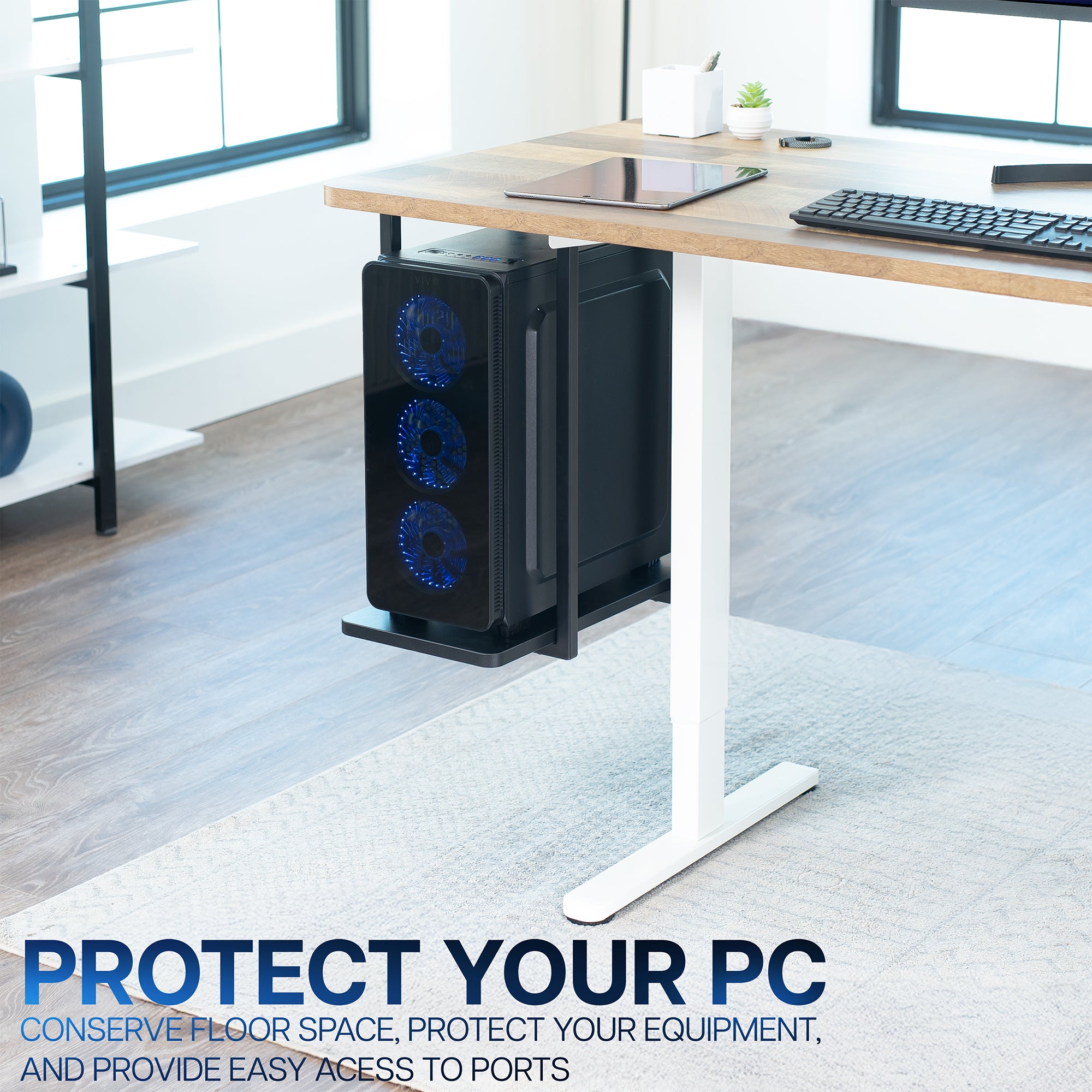 Computer tower on a stand in front of a desk with text.