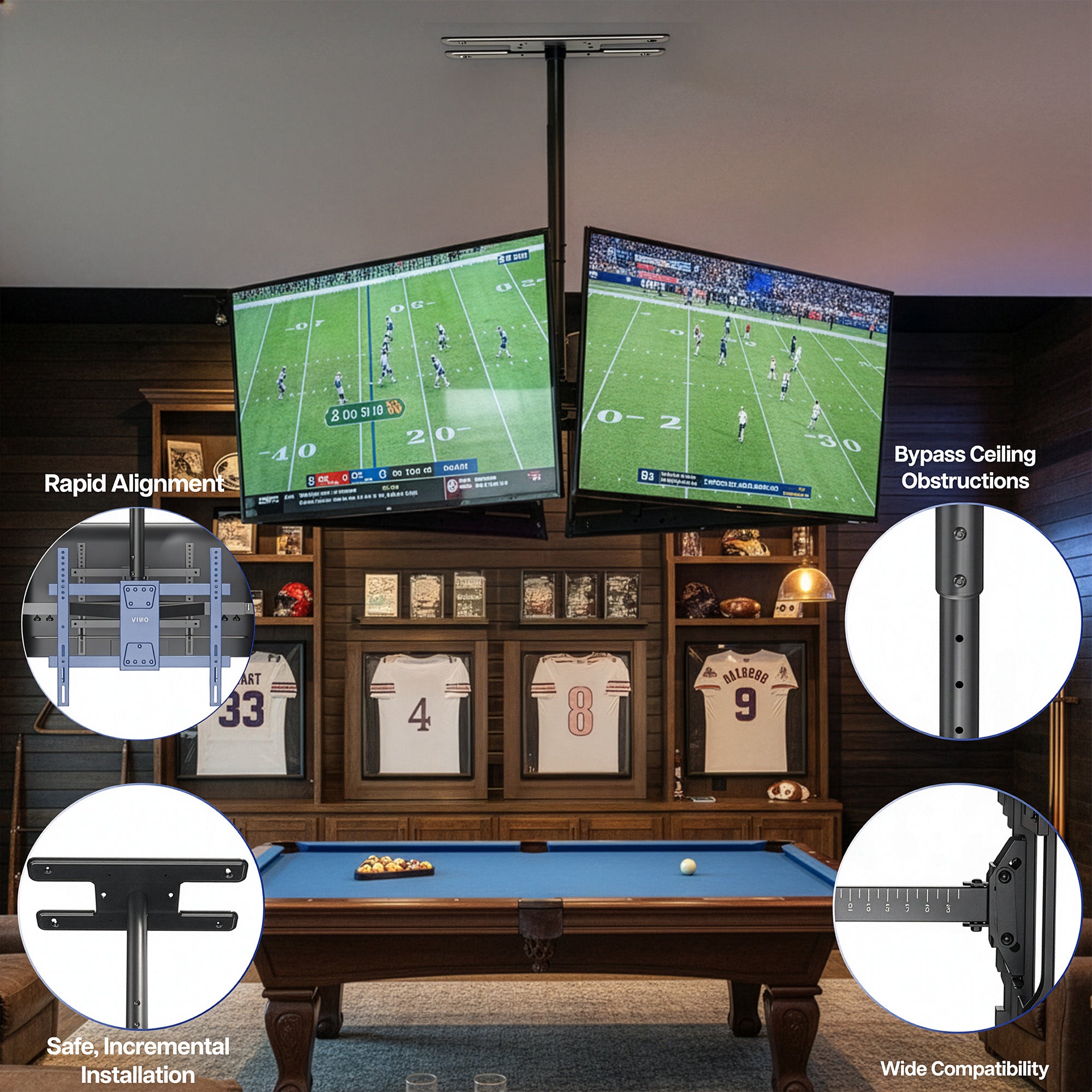 Four televisions mounted on a ceiling TV mount above a pool table with sports jerseys displayed.