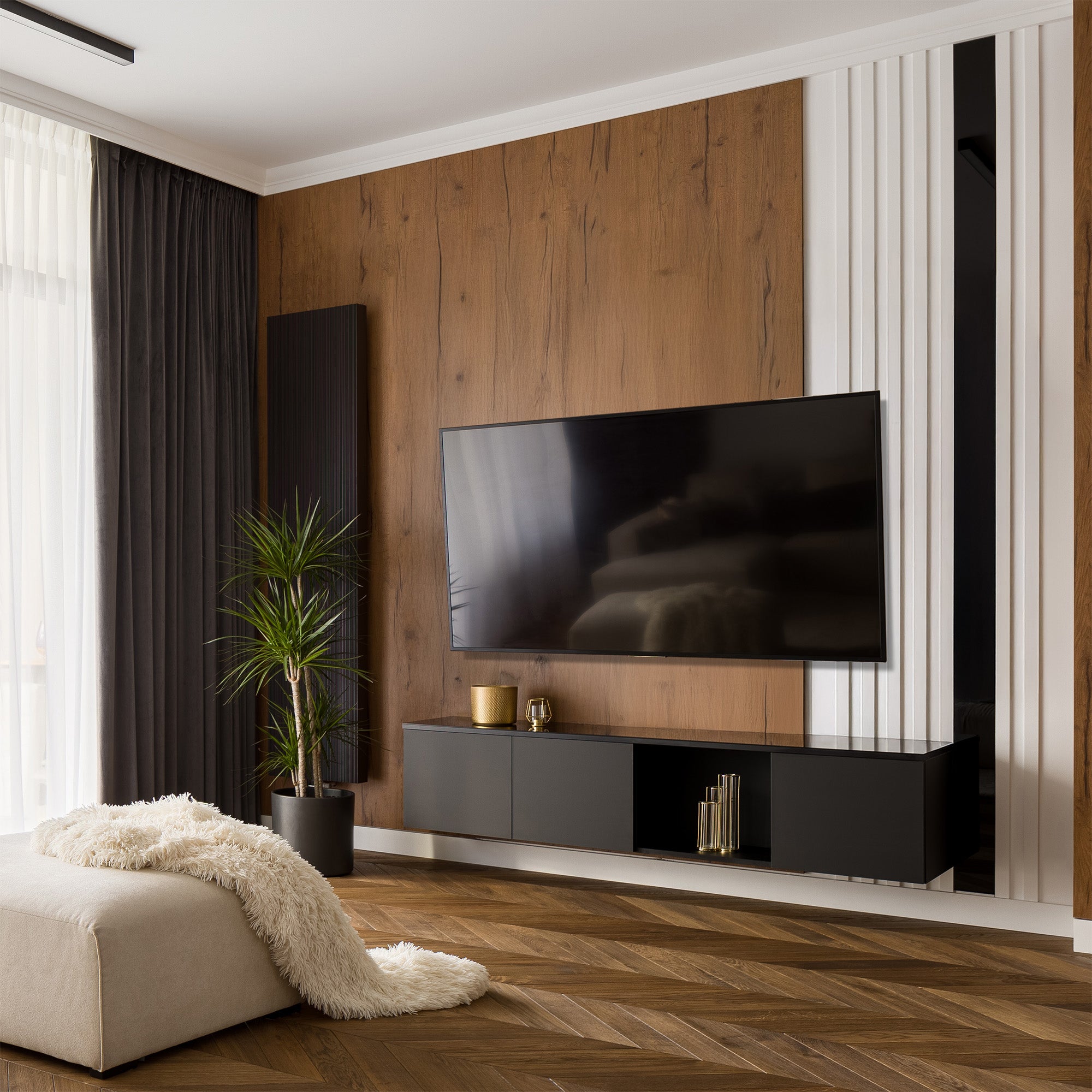 Modern living room with a television mounted on a wooden wall.
