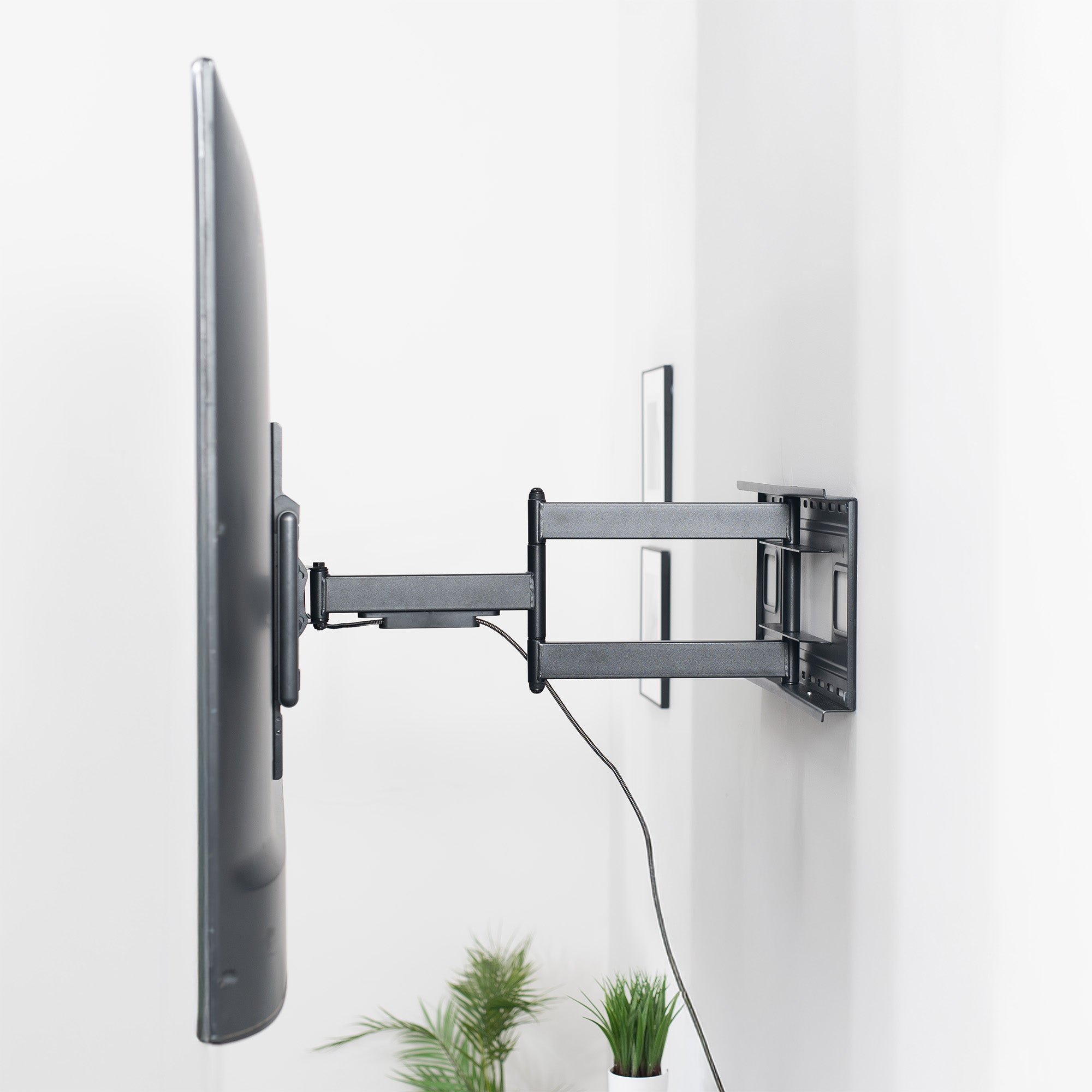 TV mounted on a wall with a minimalistic design