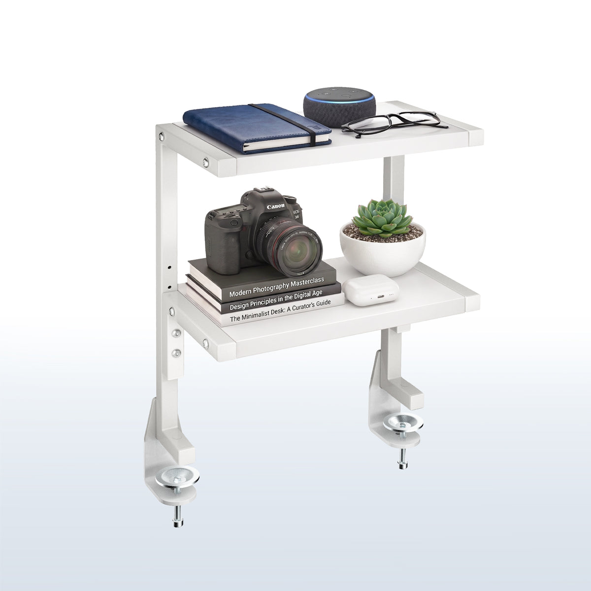 Sleek above desk or below desk clamp-on shelf with two shelves for convenient storage and organization. Lower shelf height adjusts and is removable.
