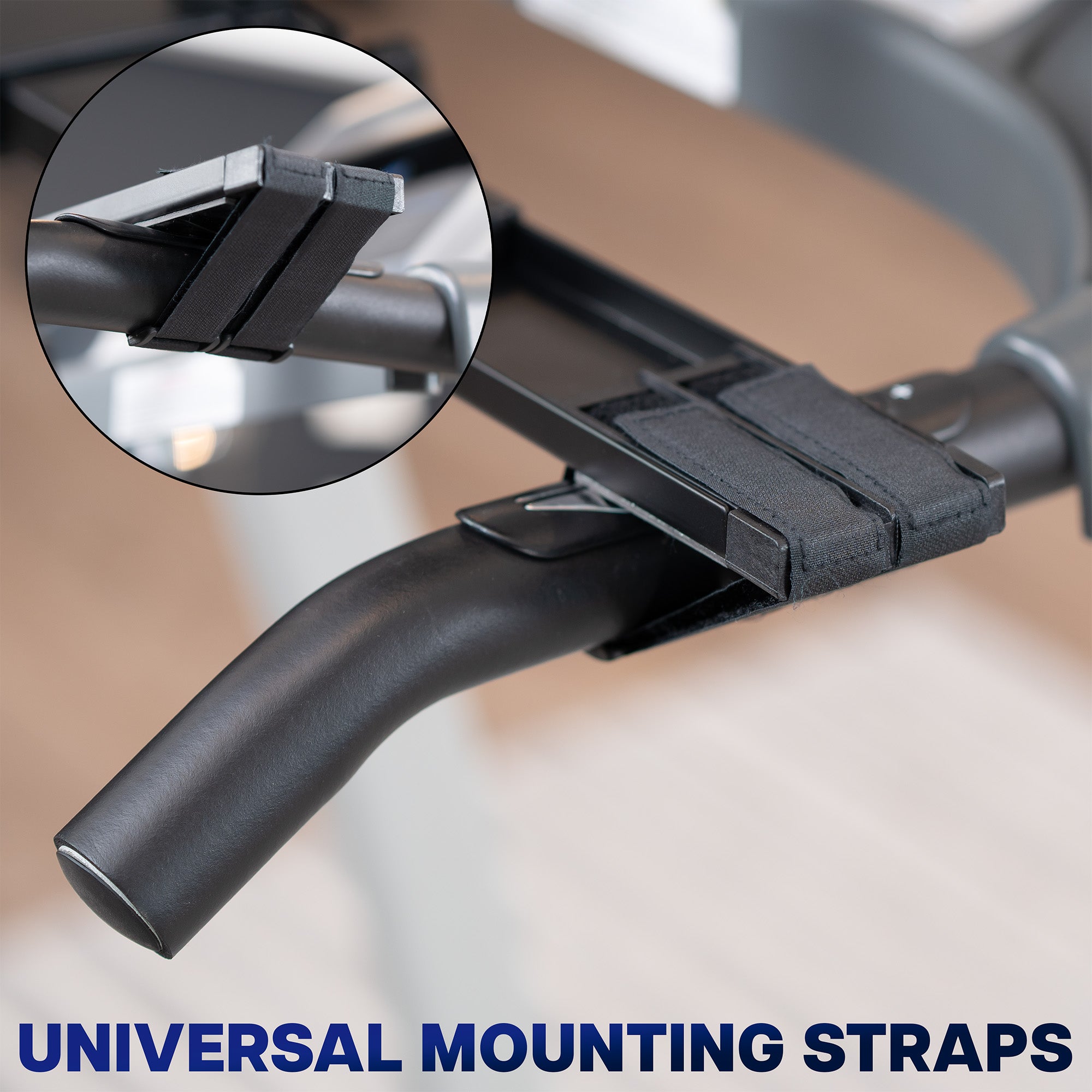 Black universal mounting strap on treadmill desk with close-up inset on a blurred background