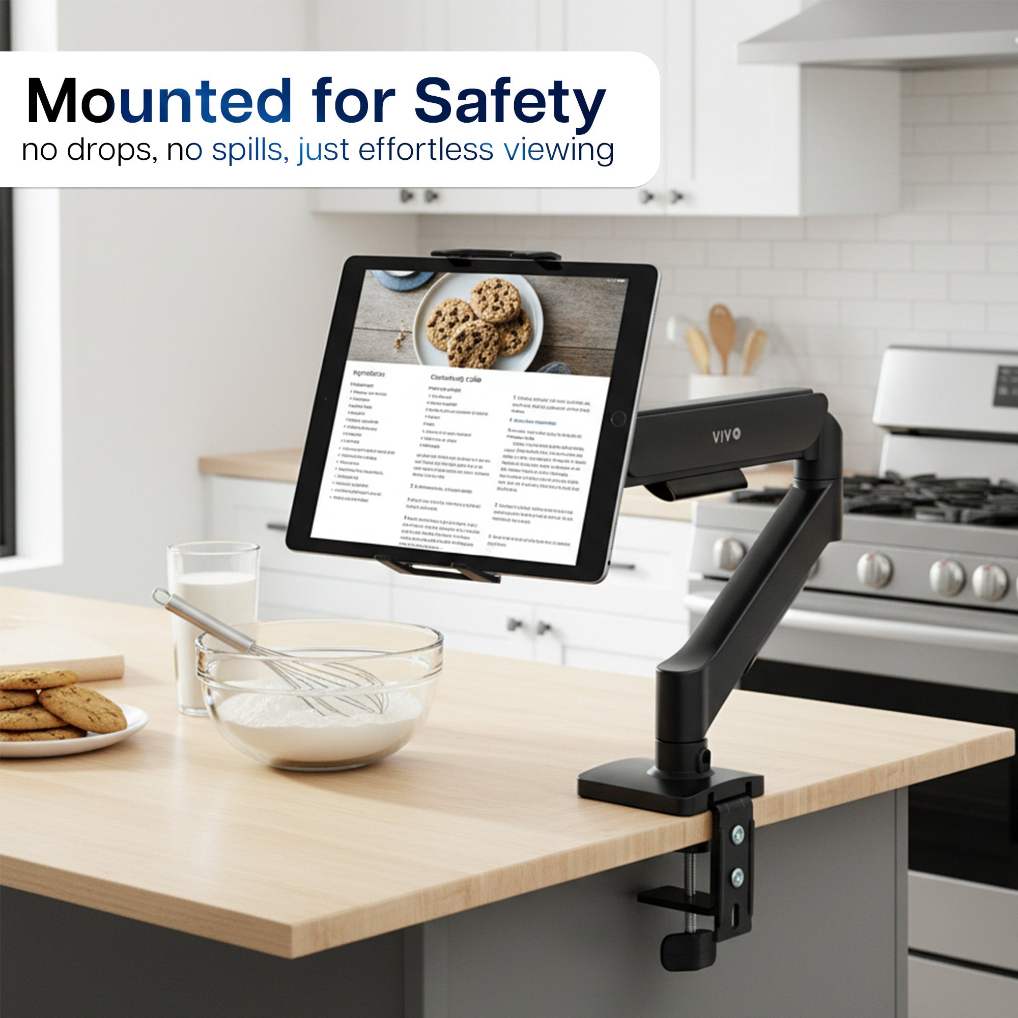 Tablet stand on a kitchen counter with a recipe displayed, text 'Mounted for Safety' above.