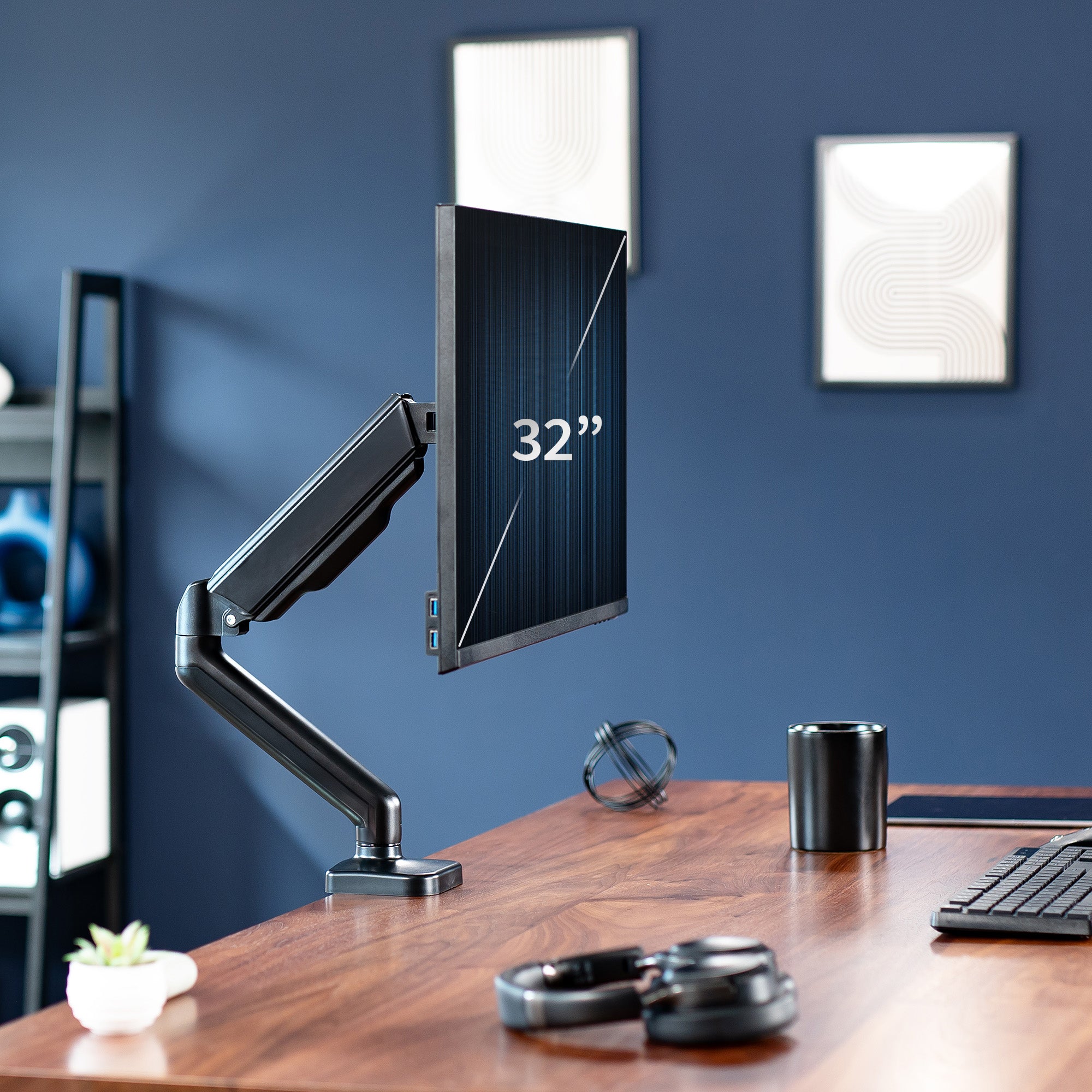 Sturdy clamp-on mechanical arm single monitor desk mount with articulation, height adjustment, and cable management.