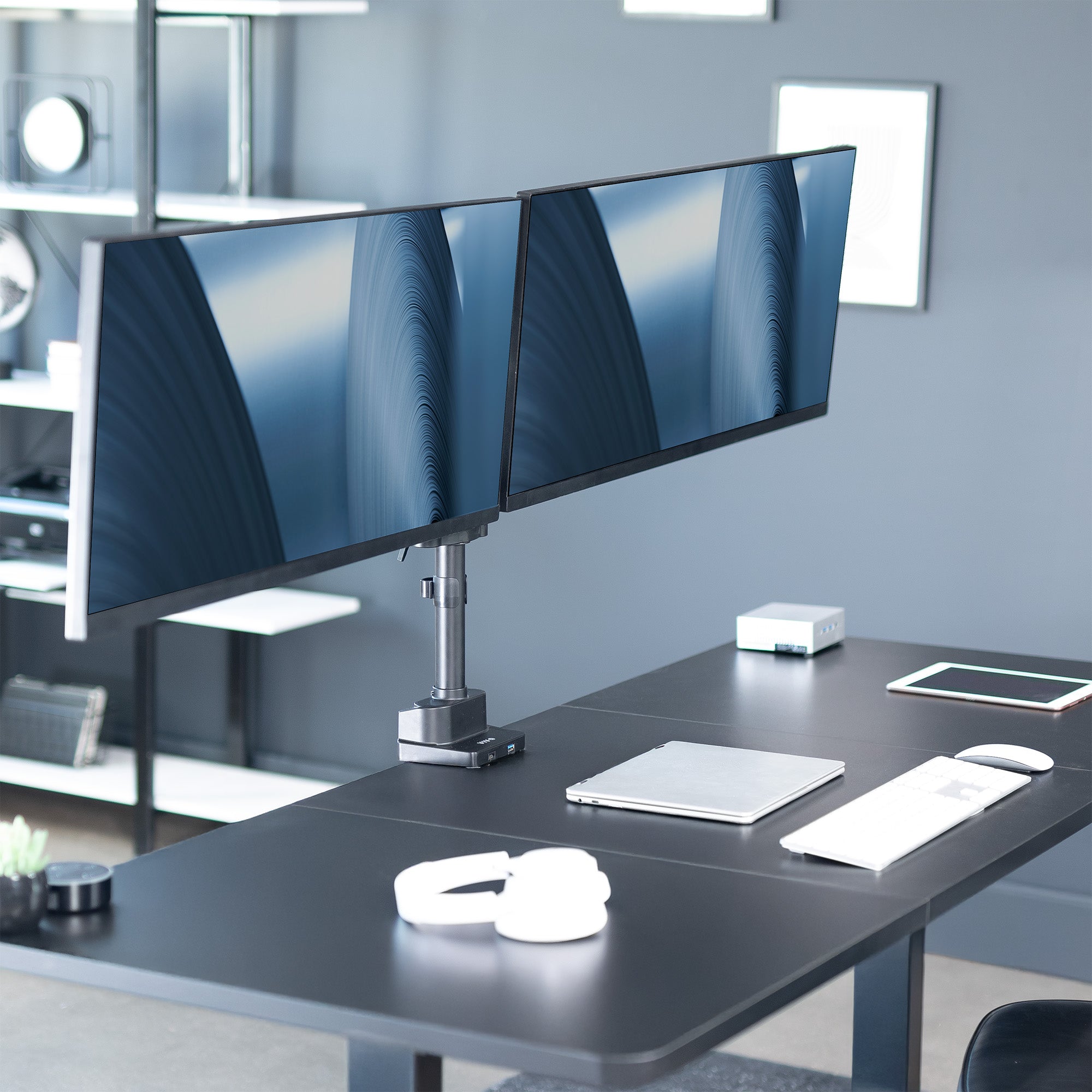 Dual Monitor Arms: Provides excellent support for two monitor screens with a built-in elbow spring gauge for seamless adjustment
