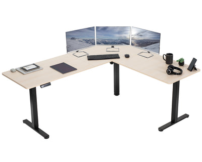 Electric heavy-duty corner desk workstation for modern office workspaces.