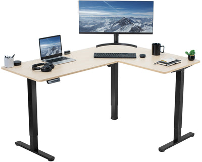 Electric heavy-duty corner desk workstation for modern office workspaces.