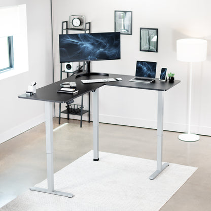 Electric heavy-duty corner desk workstation for modern office workspaces.