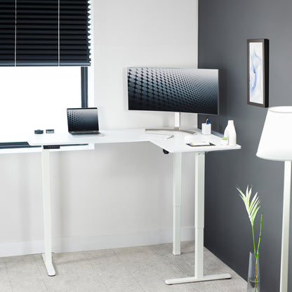 Electric heavy-duty corner desk workstation for modern office workspaces.