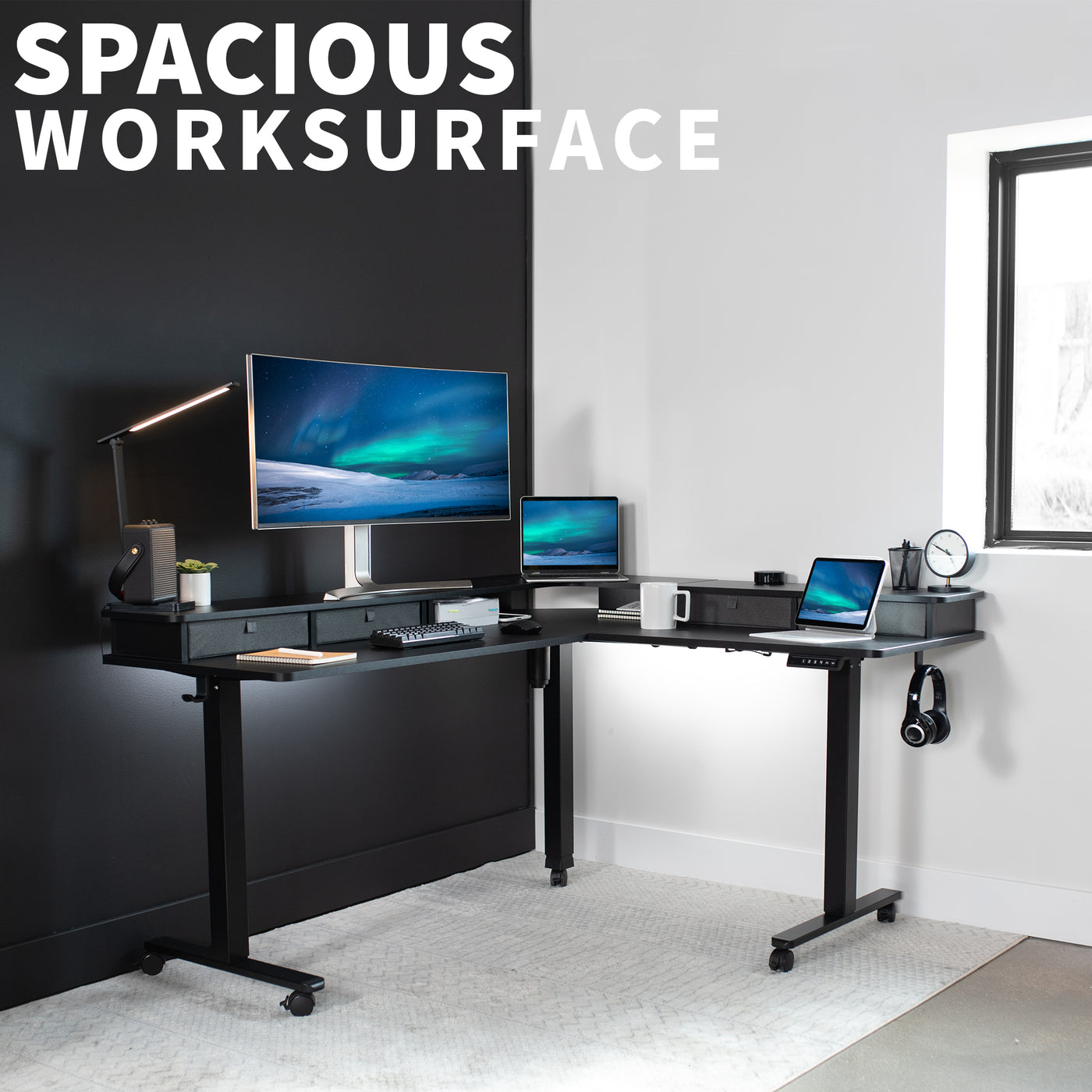 Spacious workstation surface with built-in shelving supporting multiple monitors.