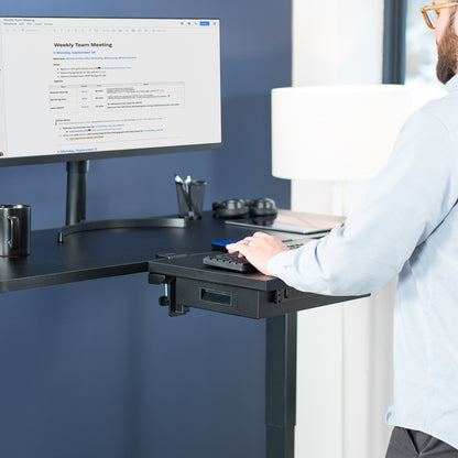 Sturdy sleek clamp-on desk extender with pull-out storage drawer. Can be mounted anywhere on desk.