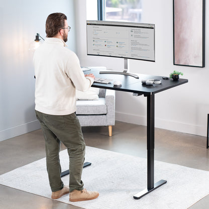 60 x 30 inch electric desk featuring easy height adjustment with the simple 2-button controller