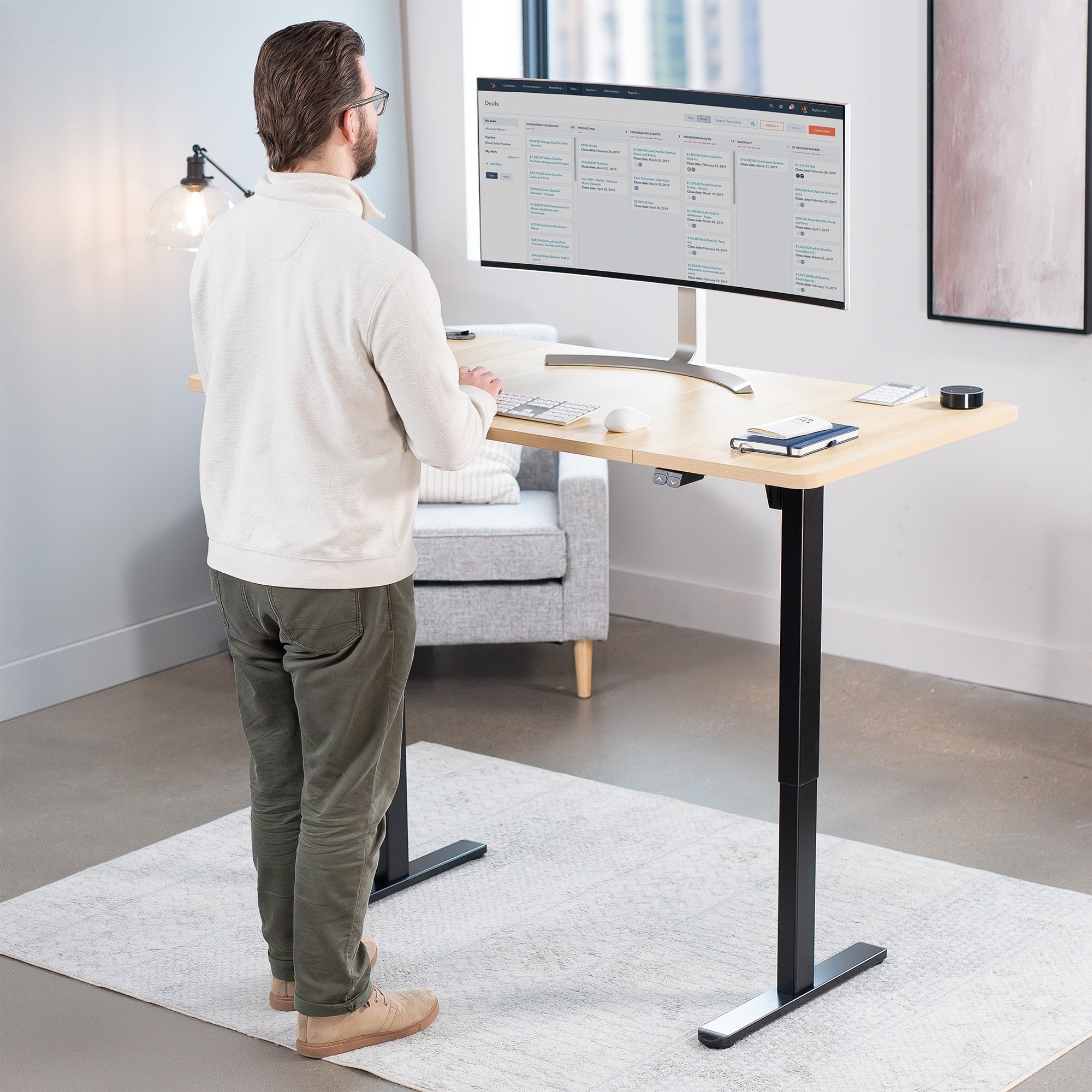 60 x 30 inch electric desk featuring easy height adjustment with the simple 2-button controller