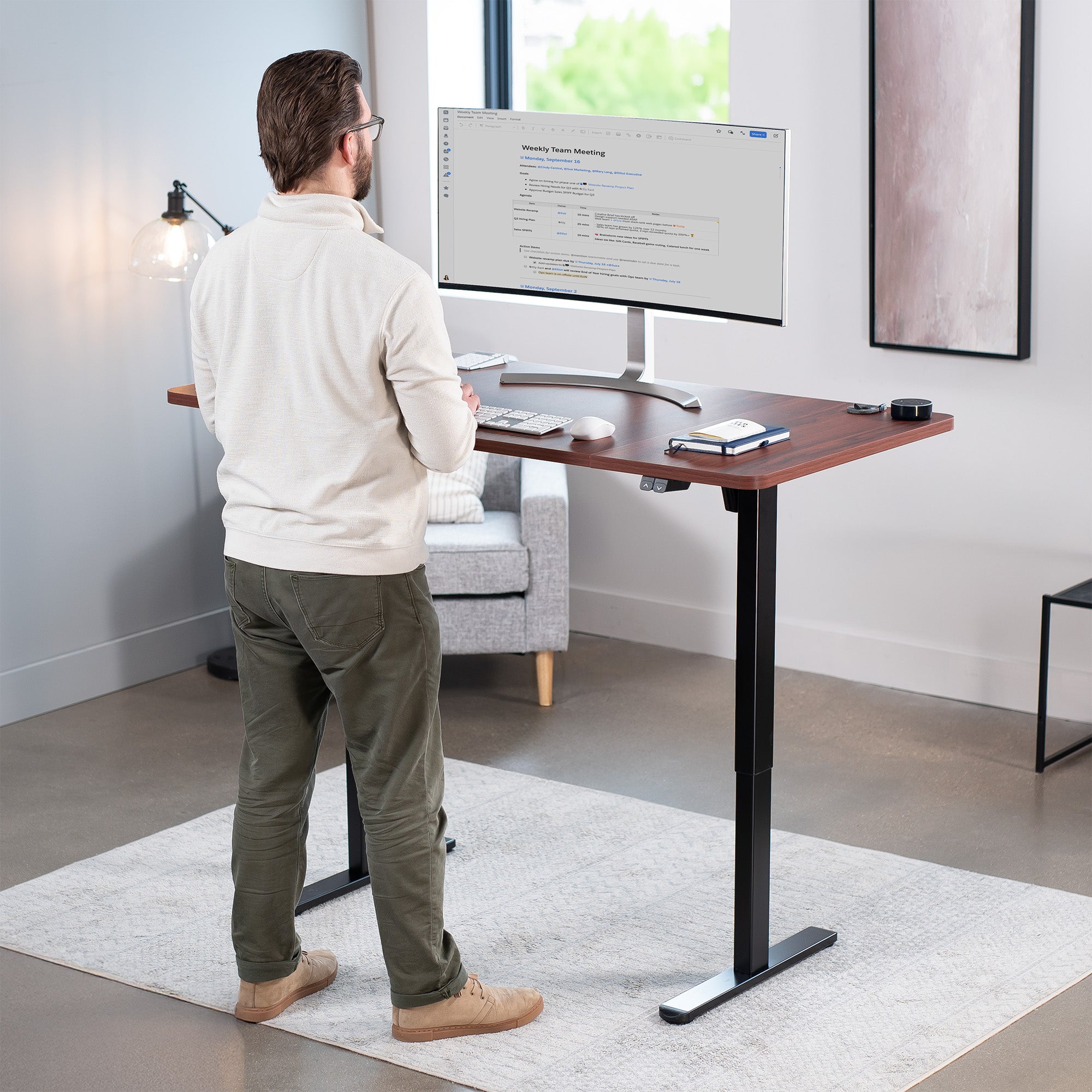 60 x 30 inch electric desk featuring easy height adjustment with the simple 2-button controller