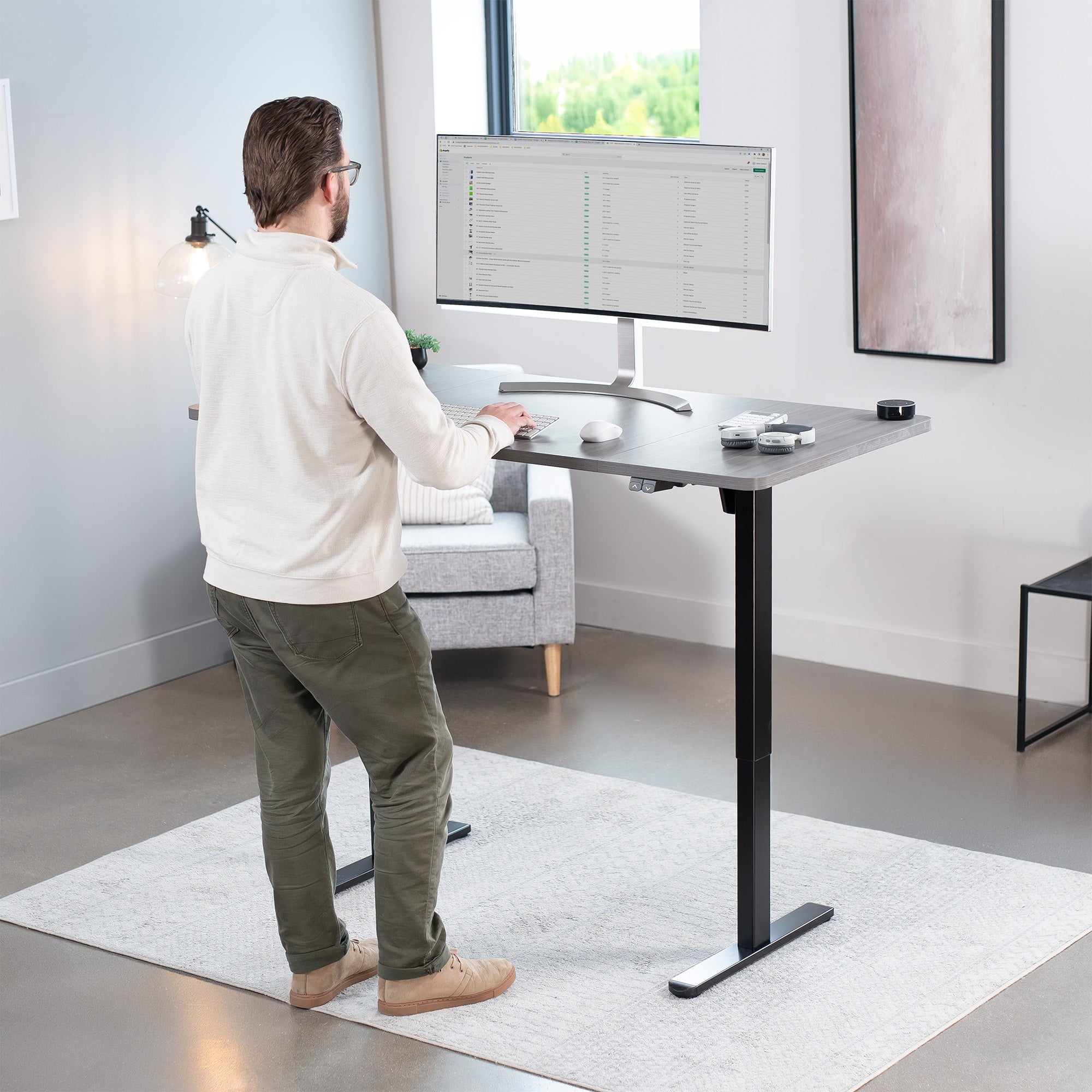 60 x 30 inch electric desk featuring easy height adjustment with the simple 2-button controller