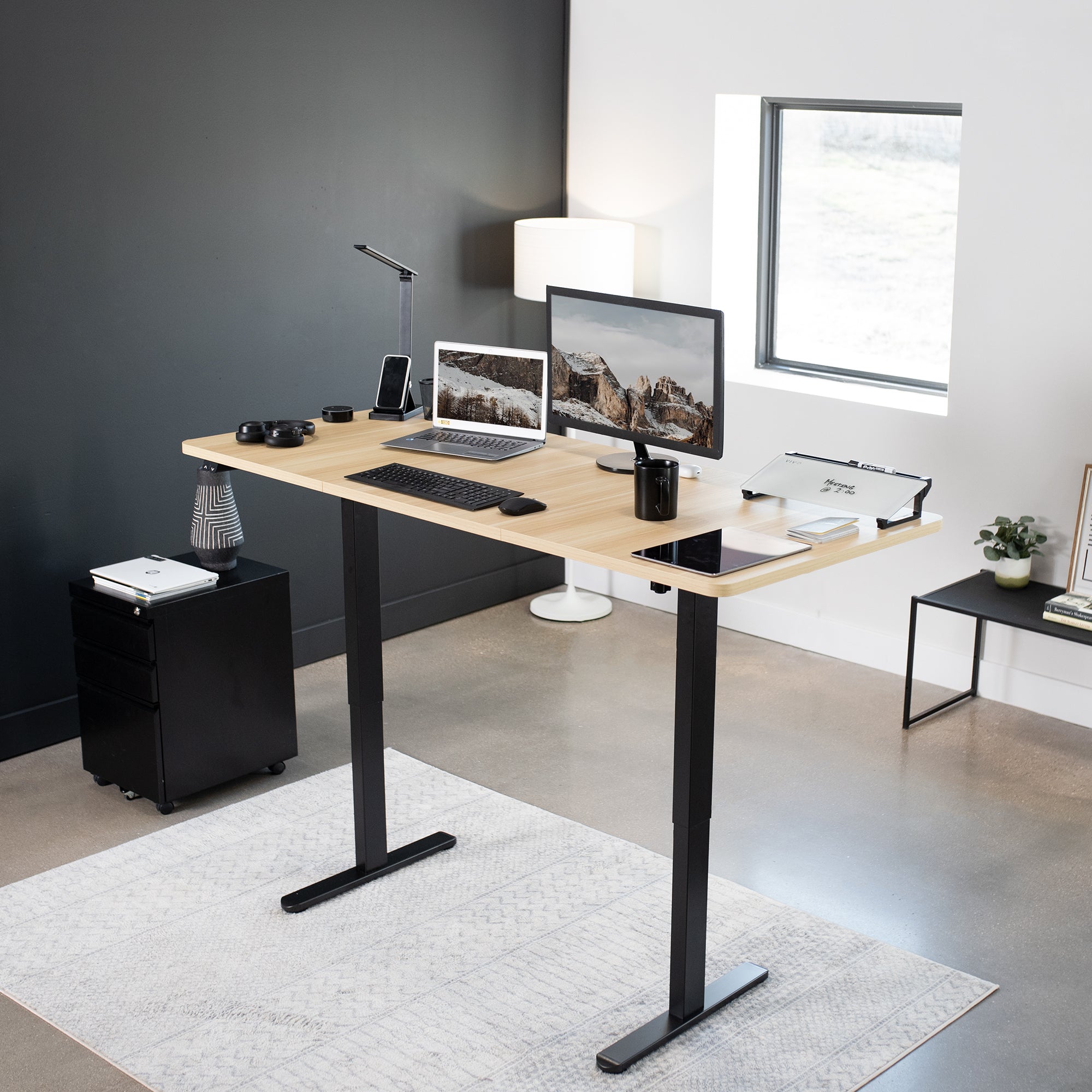 Wide surface sturdy sit or stand active workstation with adjustable height using 2 button control panel.