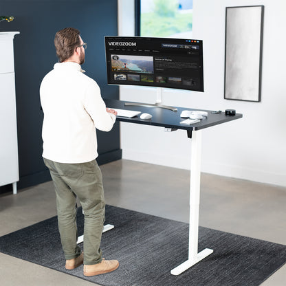 60 x 30 inch electric desk featuring easy height adjustment with the simple 2-button controller