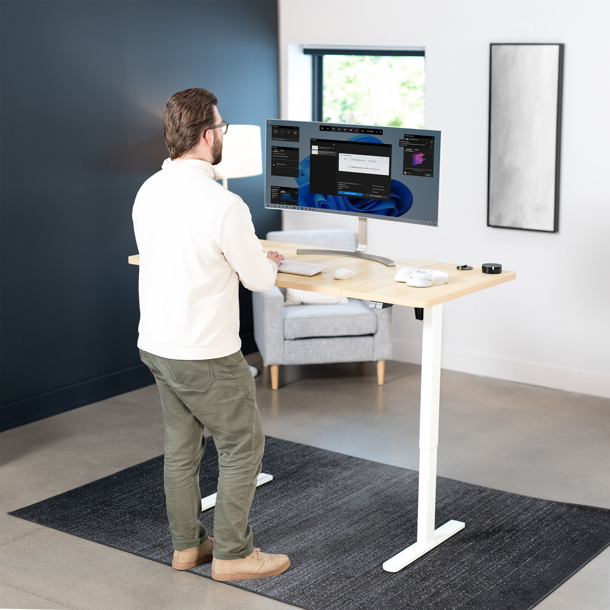 60 x 30 inch electric desk featuring easy height adjustment with the simple 2-button controller