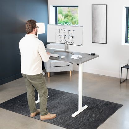 60 x 30 inch electric desk featuring easy height adjustment with the simple 2-button controller