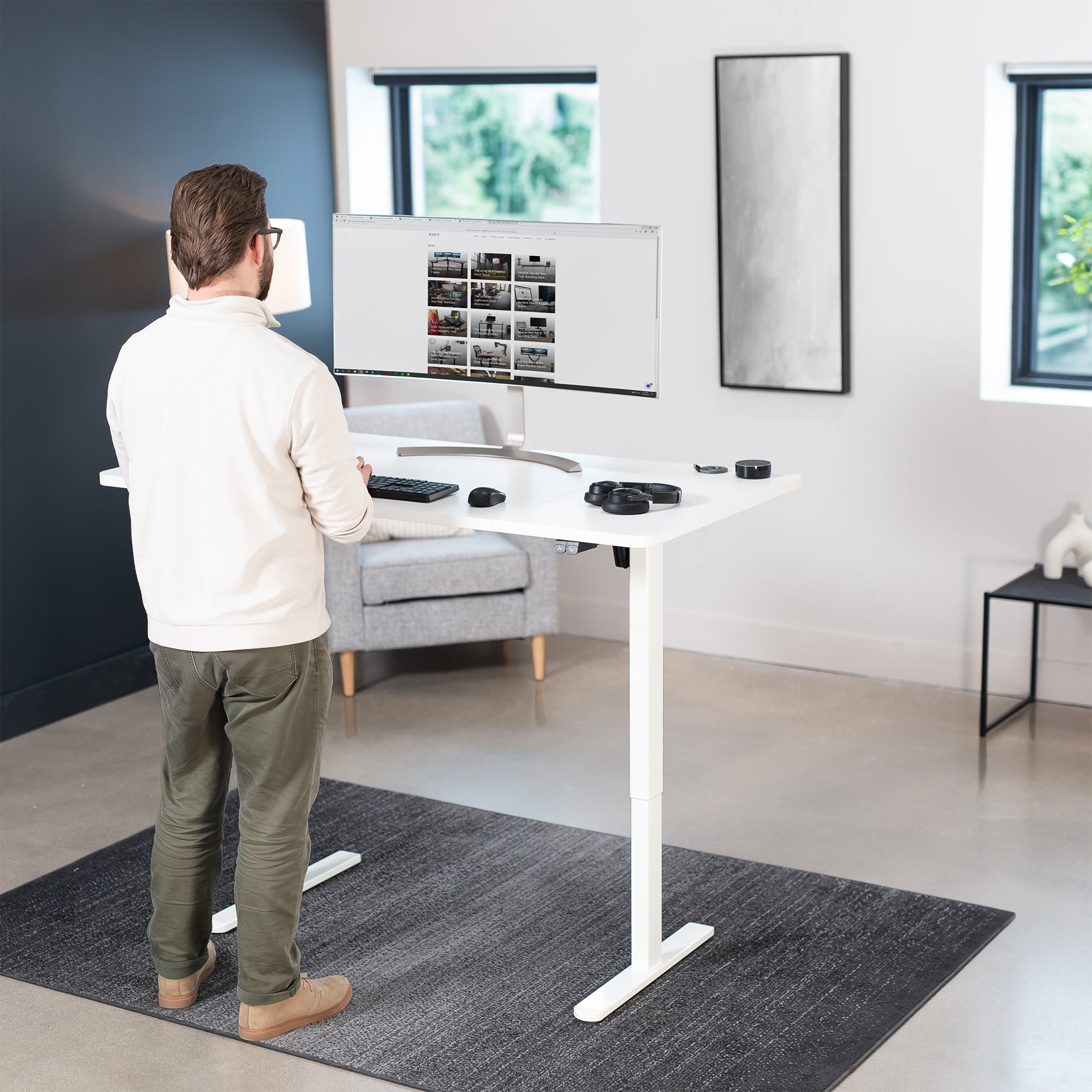 60 x 30 inch electric desk featuring easy height adjustment with the simple 2-button controller