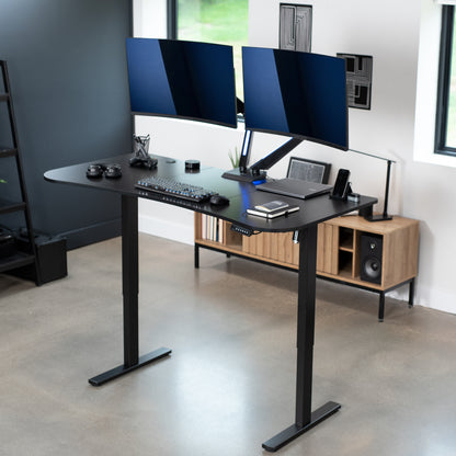 Sit to stand height adjustable electric desk with push button memory controller for ergonomic office workstation.