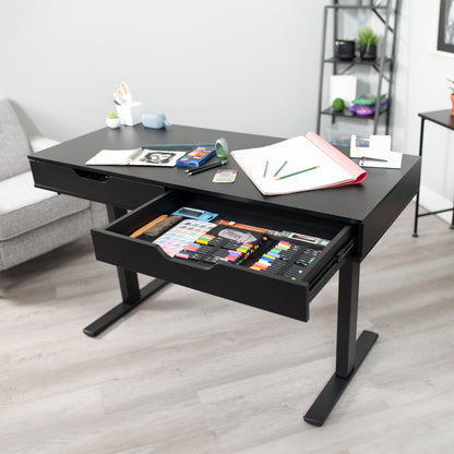 Heavy-duty electric height adjustable desk with drawers, built-in power strip, and memory controller.