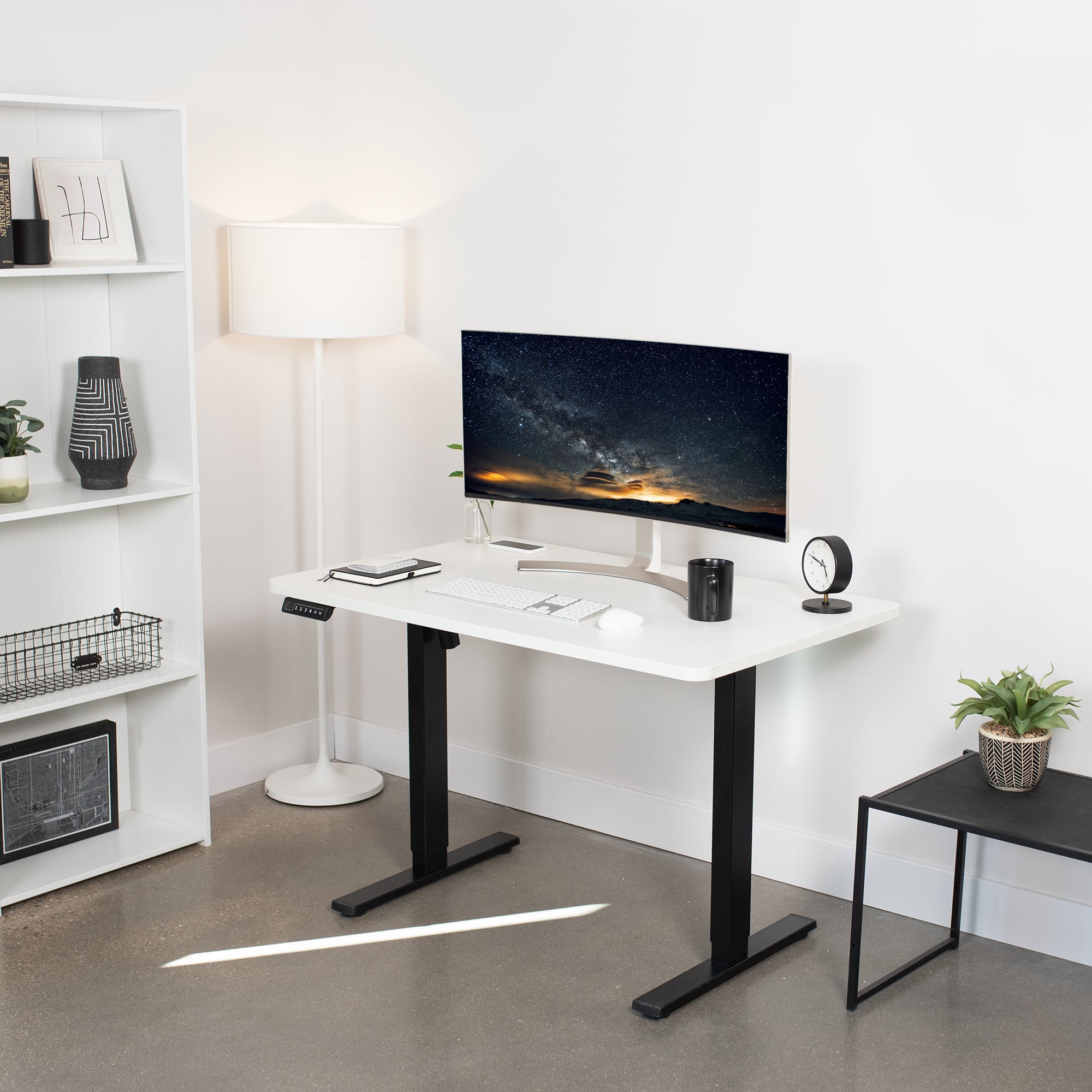 Sturdy ergonomic sit or stand active desk workstation with adjustable height using smart control panel.