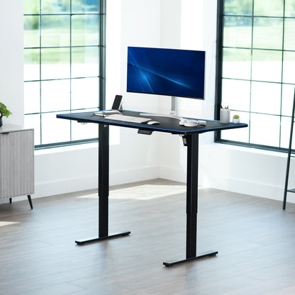 Sturdy sit or stand active workstation with adjustable height using smart control panel.