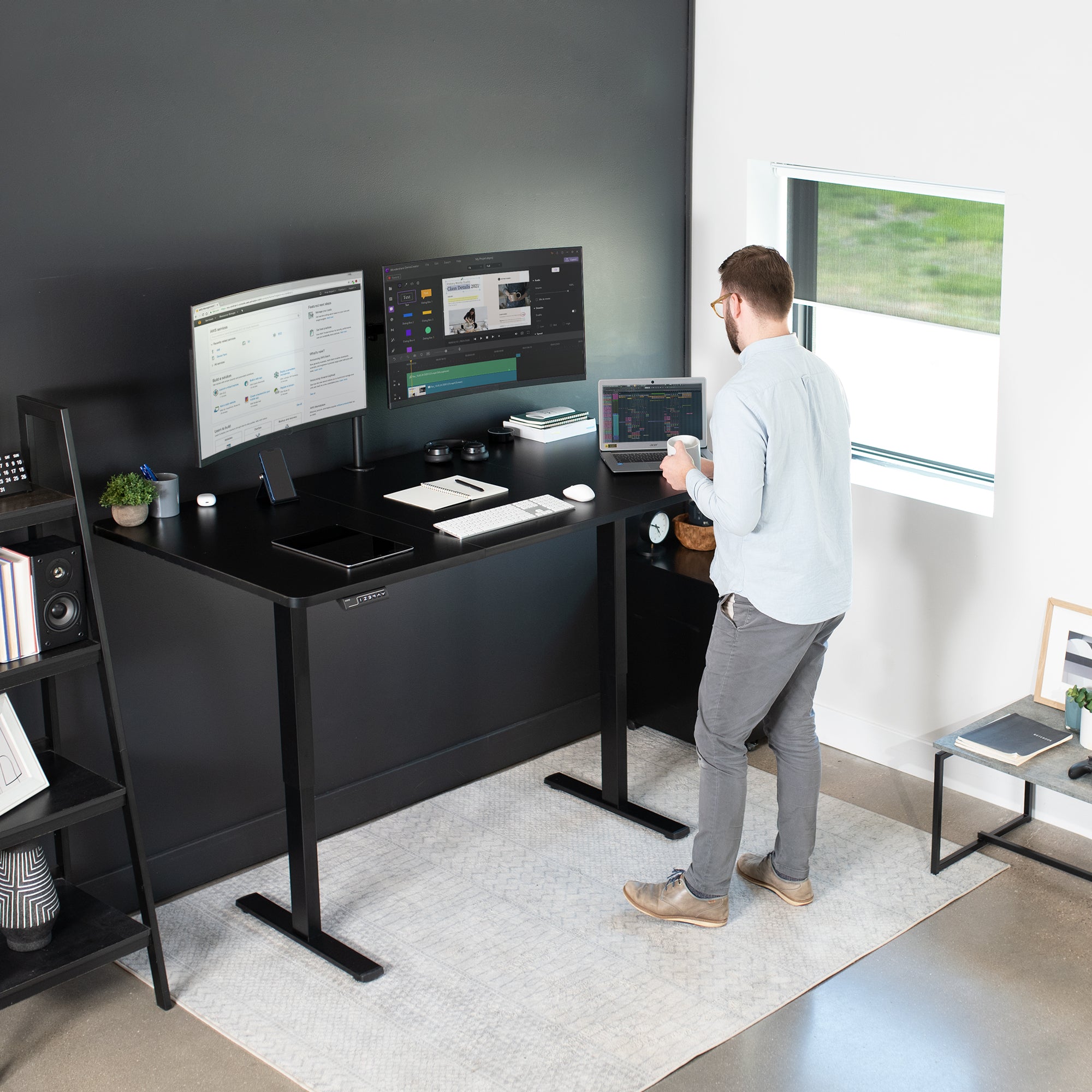 Electric desk at standing height in the home office.