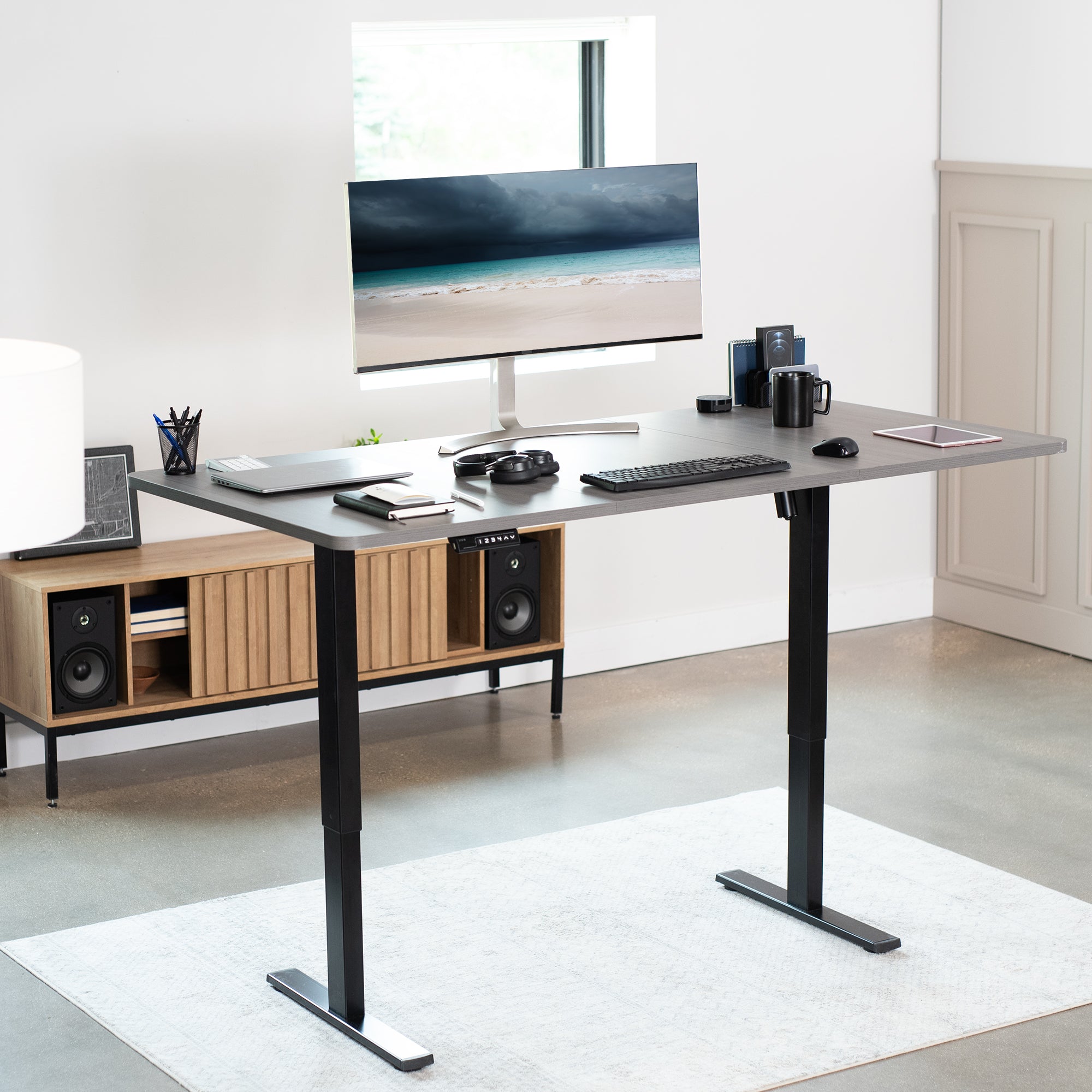 Large sturdy sit or stand active workstation with adjustable height using smart control panel.