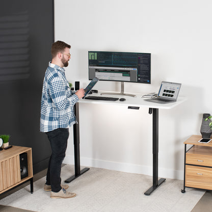 Large sturdy sit or stand active workstation with adjustable height using smart control panel.