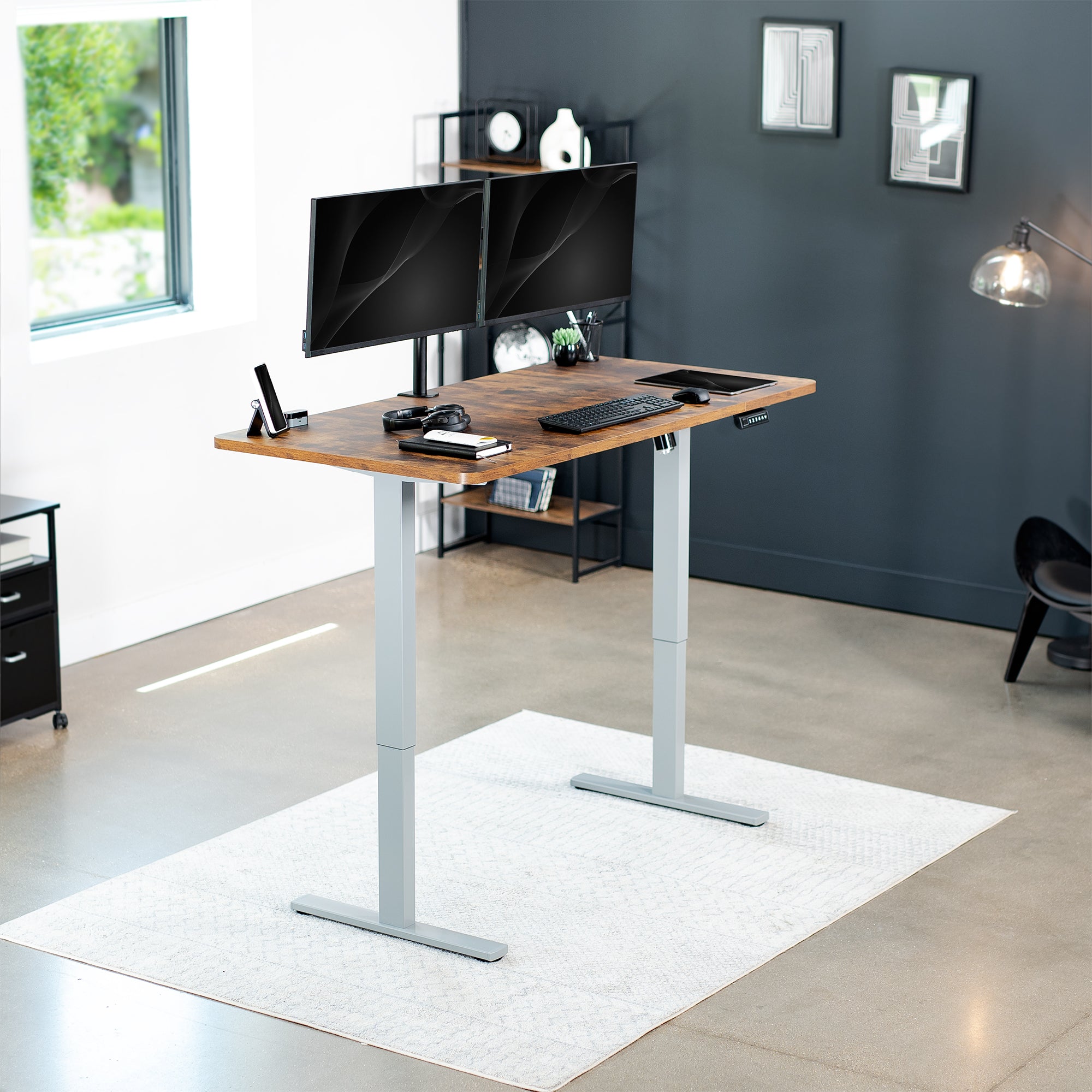 Rustic sturdy ergonomic sit or stand active desk workstation with adjustable height using smart control panel.