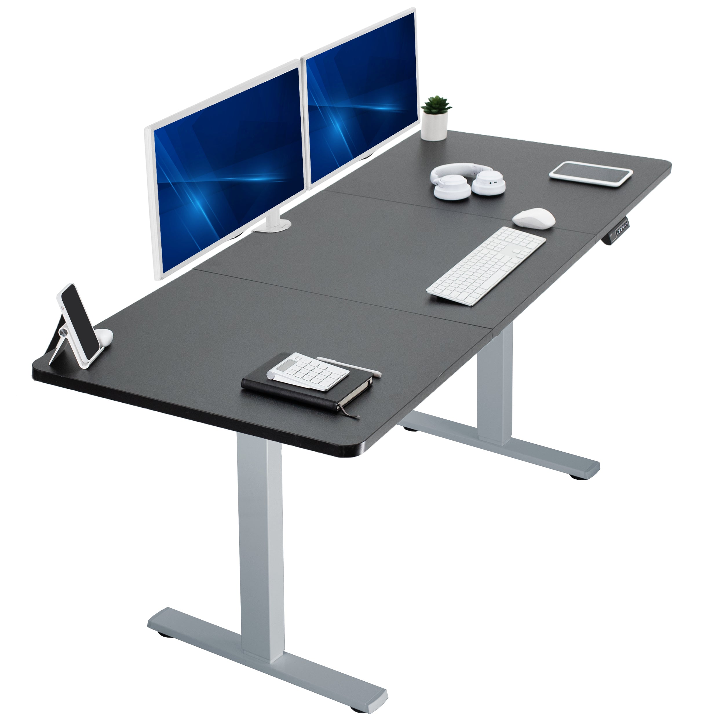 Large sturdy sit or stand modern desk with electric height adjustment options.