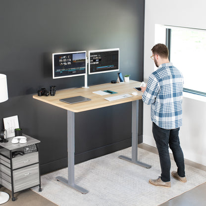 Large sturdy sit or stand active workstation with adjustable height using smart control panel.