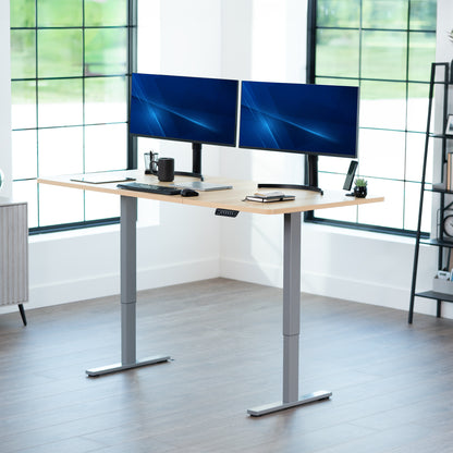 Large sturdy sit or stand modern desk with electric height adjustment options.