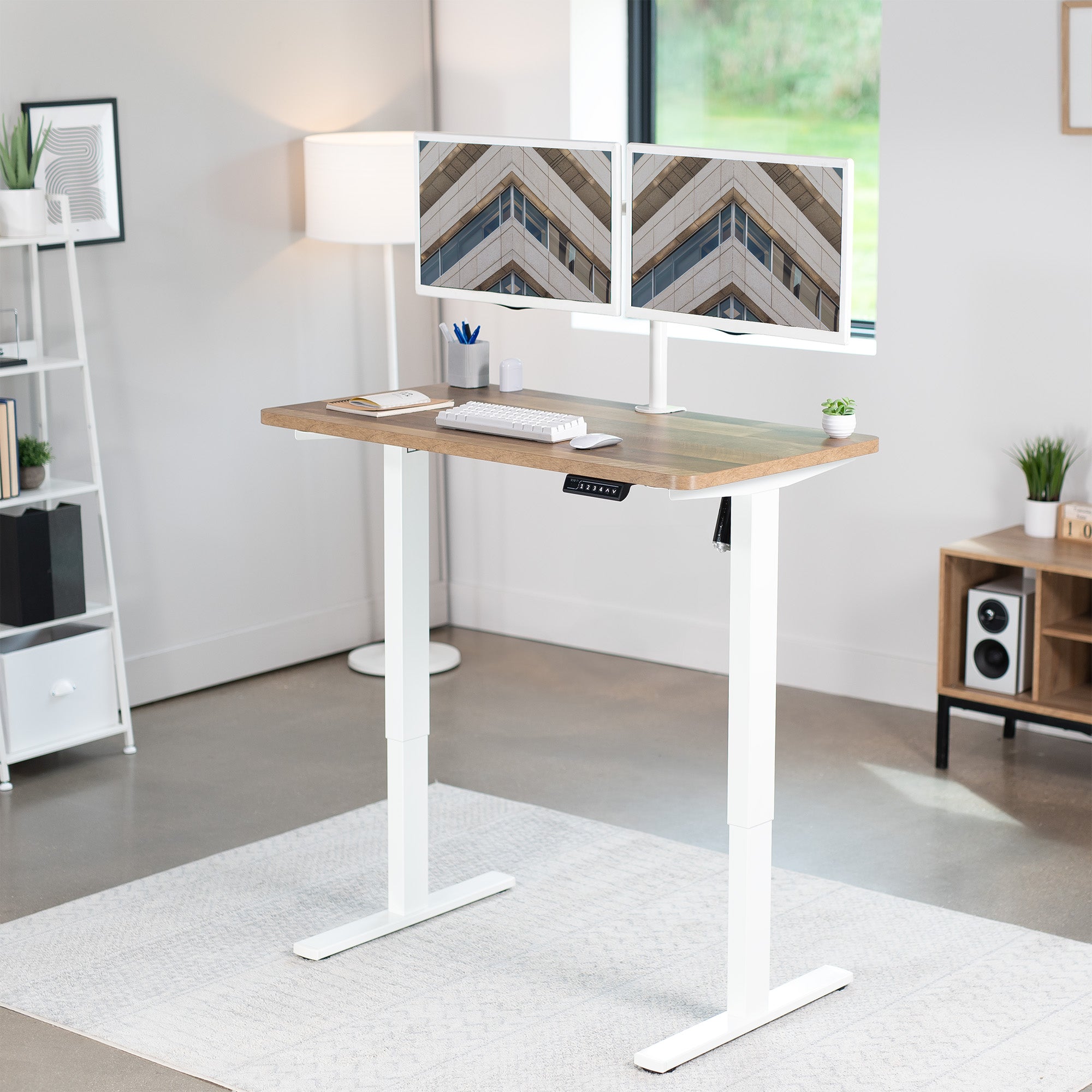 Sturdy ergonomic sit or stand active desk workstation with adjustable height using smart control panel.