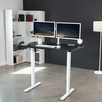 Sturdy ergonomic sit or stand active desk workstation with adjustable height using smart control panel.