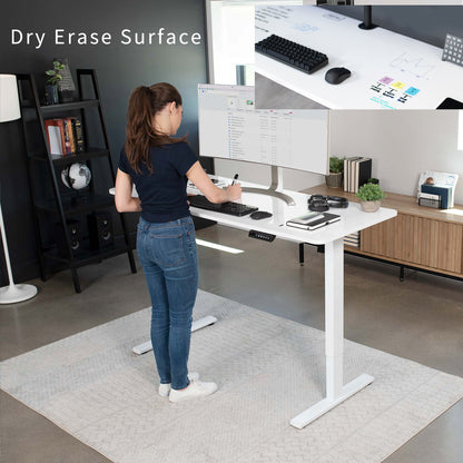 Sturdy ergonomic dry erase sit or stand active whiteboard desk workstation with adjustable height using smart control panel.