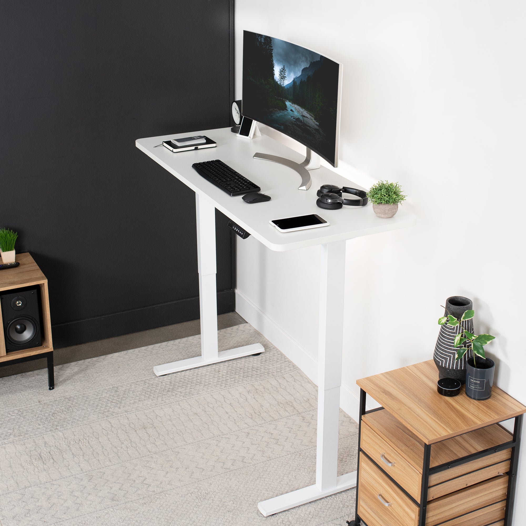 Sturdy ergonomic sit or stand active desk workstation with adjustable height using smart control panel.