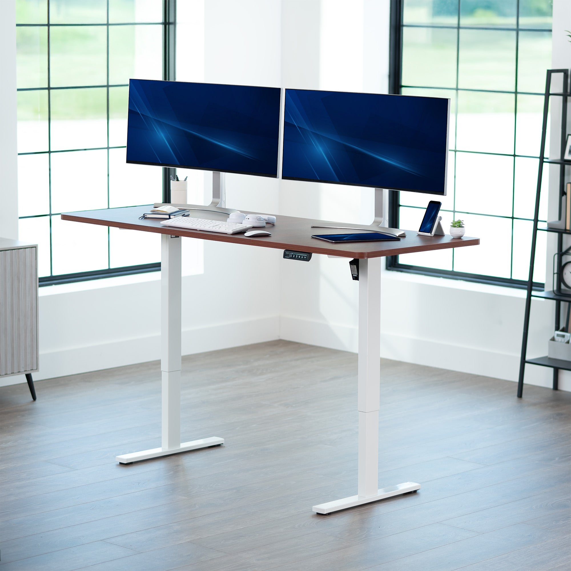Large sturdy sit or stand modern desk with electric height adjustment options.