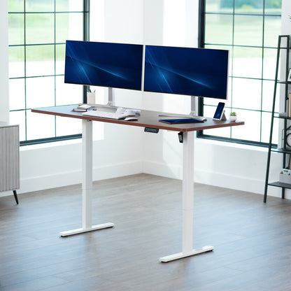 Large sturdy sit or stand modern desk with electric height adjustment options.